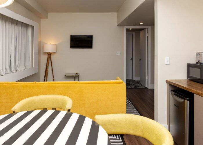 Step-free walk-in shower and lavatory in the Accessible One Bedroom Suite bathroom at Crest Hotel & Suites Miami Beach